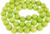 Jade, lime green, faceted round, 6mm