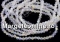 Crystal bead string, faceted biconical, white alabaster, 4mm