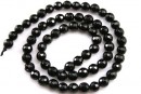 Onix, black, faceted round, 6mm