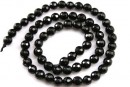 Onix, black, faceted round, 4mm